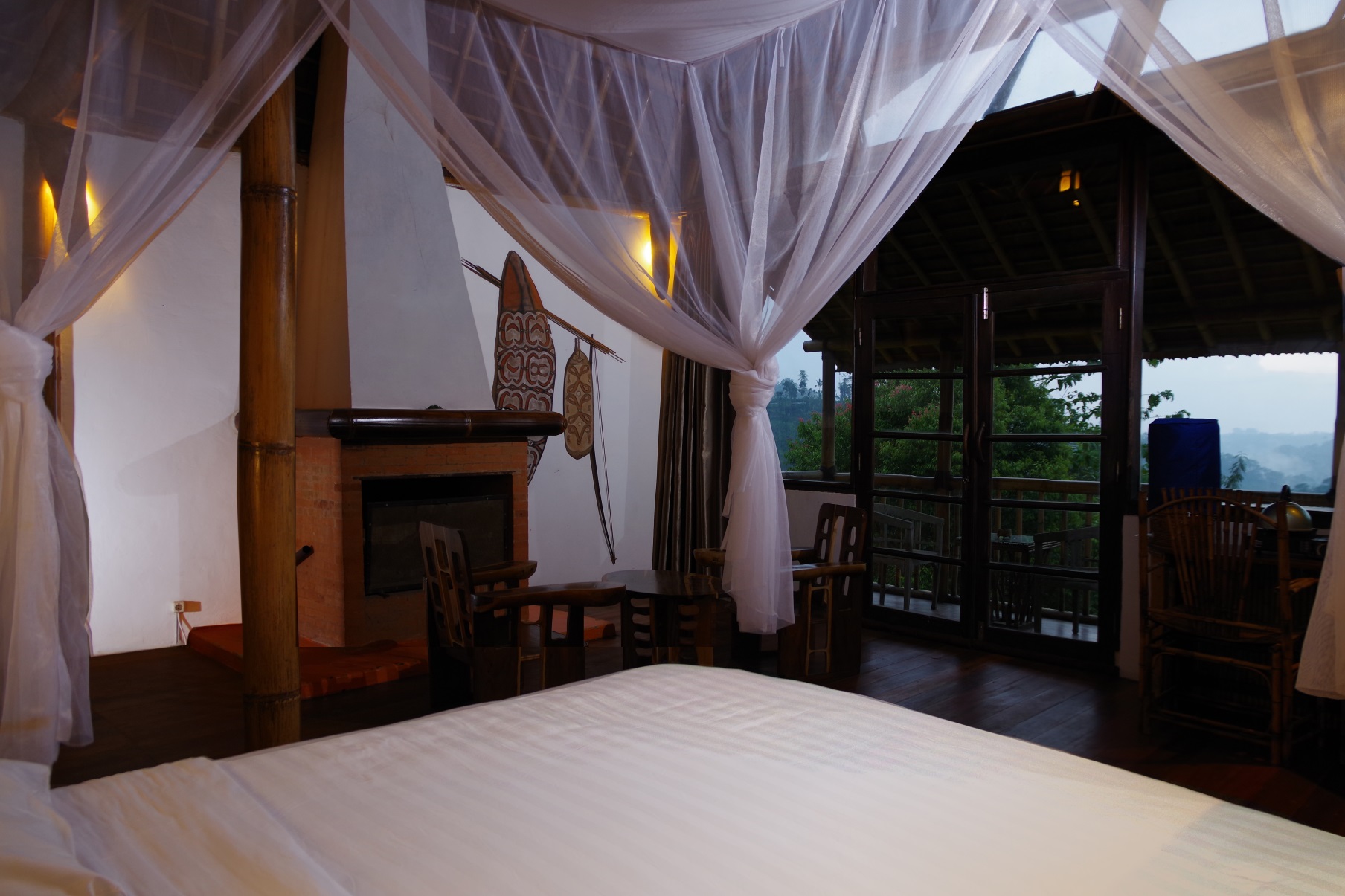 First floor, master bedroom- different angle, with outside view visible